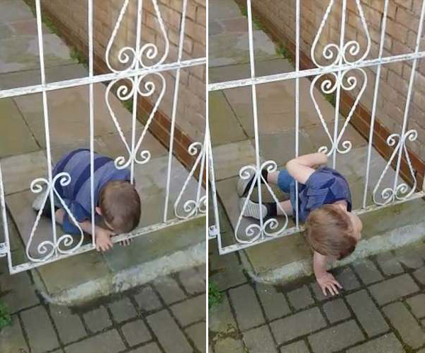 英3岁男童趁父母不注意从铁门缝隙钻出玩耍