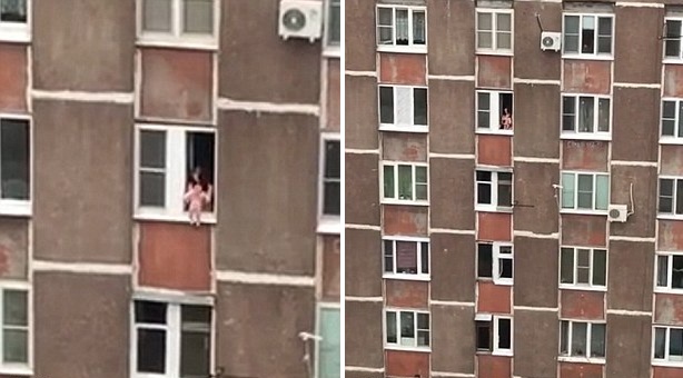 俄母亲将婴儿悬在窗外 称为让其呼吸新鲜空气