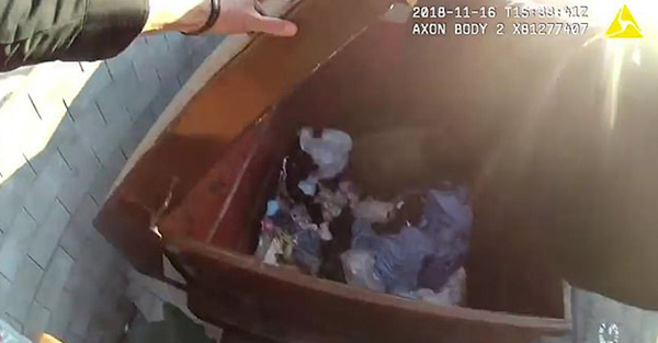 暖心！加州警官与熊温馨对话救出被困垃圾桶幼熊