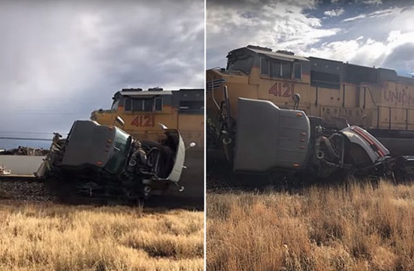 美国一半挂卡车与货运列车相撞被卡铁轨