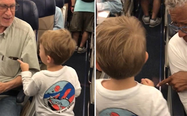 美三岁男童飞机上与每位乘客打招呼讨人喜爱