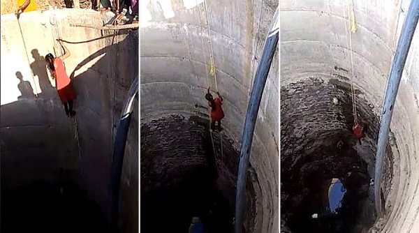 印度一干旱地区妇女徒手爬下18米深水井取水